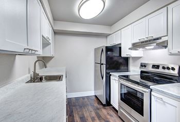 Kitchen with white cabinets